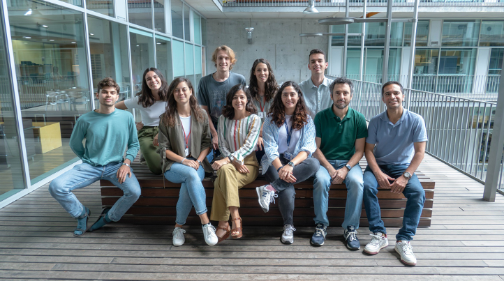 Integra group photo in a well lit outdoor patio