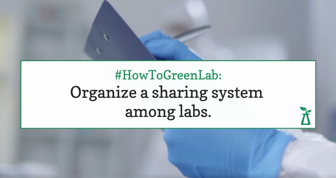 person writing on paper wearing blue gloves